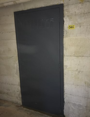 Fourniture et pose d'un bloc porte blindée de cave